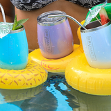 Brumate's aqua and violet wine tumblers in pool floaties with cute little drink garnishes.