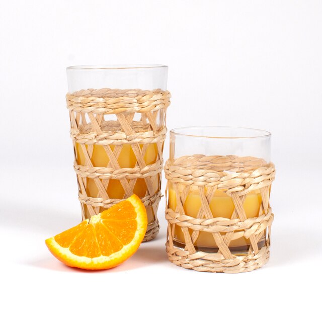 Rattan pint glass and dof in picture together with orange wedge.